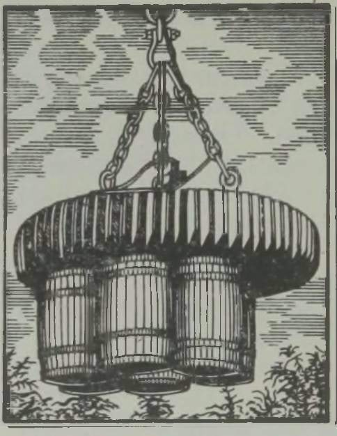 Naeltega täidetud tünne transportiv elektromagnetkraana